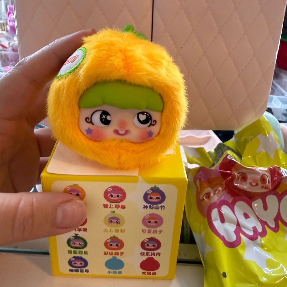 Plush Toy with Green and Yellow Design